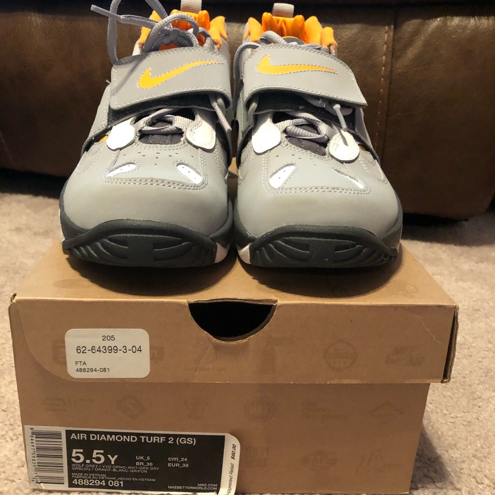 Nike Kids Gray Sneakers with Orange and Yellow Accents